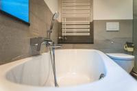 Kúpeľňa v ubytovaní Chalet Crown of the Alps by we rent