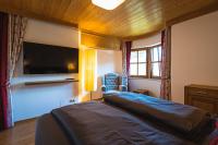 Posteľ alebo postele v izbe v ubytovaní Chalet Crown of the Alps by we rent
