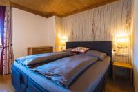 Posteľ alebo postele v izbe v ubytovaní Chalet Crown of the Alps by we rent