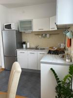 Kuchyňa alebo kuchynka v ubytovaní LIPA Apartment