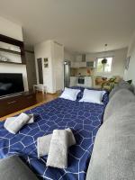Posteľ alebo postele v izbe v ubytovaní LIPA Apartment