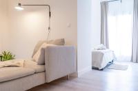Postel nebo postele na pokoji v ubytování Suites Alfonso X