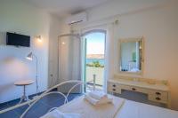 Posteľ alebo postele v izbe v ubytovaní Christina Boutique Studios Elounda