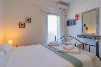 Posteľ alebo postele v izbe v ubytovaní Christina Boutique Studios Elounda