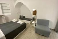 Łóżko lub łóżka w pokoju w obiekcie Catania Dammuso house