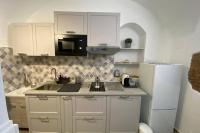 Kuchnia lub aneks kuchenny w obiekcie Catania Dammuso house