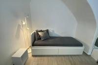 Łóżko lub łóżka w pokoju w obiekcie Catania Dammuso house