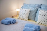 A bed or beds in a room at Zsuka apartman free parking