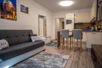 A kitchen or kitchenette at Zsuka apartman free parking