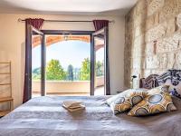 Posteľ alebo postele v izbe v ubytovaní Holiday Home Casa Chiara - SIC400 by Interhome