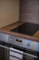 A kitchen or kitchenette at Zsuka apartman free parking