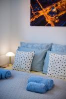 A bed or beds in a room at Zsuka apartman free parking