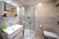 A bathroom at Zsuka apartman free parking
