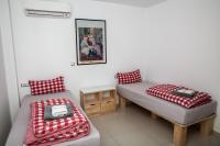 Posteľ alebo postele v izbe v ubytovaní 5 Sterne Zeus City Apartment mit Meerblick