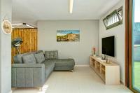 TV a/nebo společenská místnost v ubytování Harmony Level Floor