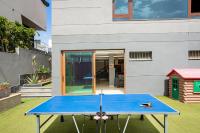 Stolní tenis v ubytování Harmony Level Floor nebo okolí