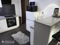 Kuchyň nebo kuchyňský kout v ubytování Apartman MB