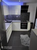 Kuchyň nebo kuchyňský kout v ubytování Apartman MB