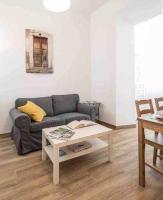 A seating area at Apartamentos Alcazaba