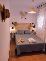 Posteľ alebo postele v izbe v ubytovaní Dos Casas juntas y Patio común a 25 metros de la Playa