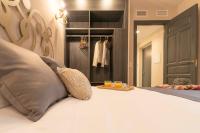 Postel nebo postele na pokoji v ubytování Palacete 1620, Premium Suites, Only adults