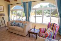 Posedenie v ubytovaní Casa Ana - delightful semi-detached villa with large swimming pool, tennis court and huge gardens plus Free wifi