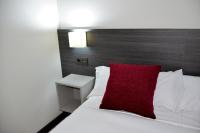 Postel nebo postele na pokoji v ubytování Apartamentos Capua