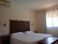 Postel nebo postele na pokoji v ubytování Villa Oasis II