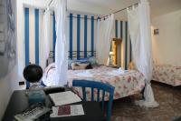 Posteľ alebo postele v izbe v ubytovaní Albergo Del Centro Storico
