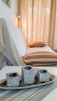 A bed or beds in a room at MNG-Apart Playa Americas Honda