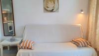 A bed or beds in a room at MNG-Apart Playa Americas Honda