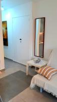 A bed or beds in a room at MNG-Apart Playa Americas Honda