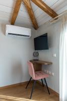 Telewizja i/lub zestaw kina domowego w obiekcie Samis Pelion LuxuryLiving