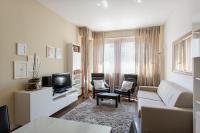 Telewizja i/lub zestaw kina domowego w obiekcie Beautiful Apartment next to Sempione and City Life - Viale Teodorico
