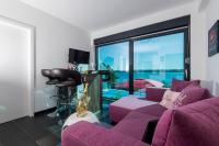 TV a/nebo společenská místnost v ubytování Design-Beachresort