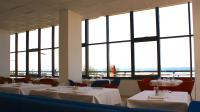 Reštaurácia alebo iné gastronomické zariadenie v ubytovaní Hotel Palazzo Caveja