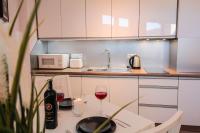 Kuchyňa alebo kuchynka v ubytovaní Apartamenty City Center - Zdrojowe