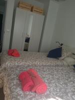 A bed or beds in a room at Apartamento Maresia