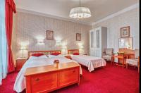 Postel nebo postele na pokoji v ubytování Hotel Salvator