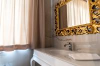 Kúpeľňa v ubytovaní Rosso Aparthotel