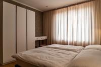 Posteľ alebo postele v izbe v ubytovaní Rosso Aparthotel