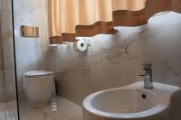 Kúpeľňa v ubytovaní Rosso Aparthotel