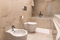 Kúpeľňa v ubytovaní Rosso Aparthotel
