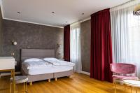 Posteľ alebo postele v izbe v ubytovaní Rosso Aparthotel