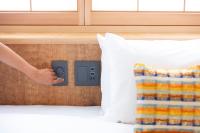 Hotel Kanazawa Zoushiにあるベッド