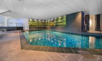 Boshotel - Vlodrop, Roermondの敷地内または近くにあるプール
