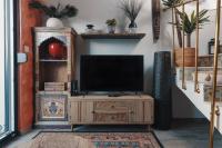 Televízia a/alebo spoločenská miestnosť v ubytovaní Studio Apartman Bohem