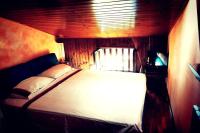 Łóżko lub łóżka w pokoju w obiekcie Chalet Mon Amour