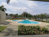 Bazén v ubytování Your Space piscina, parque infantil, 3 habitaciones , Res Breezes Santiago nebo v jeho okolí