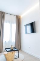 TV a/nebo společenská místnost v ubytování Suites Alfonso X